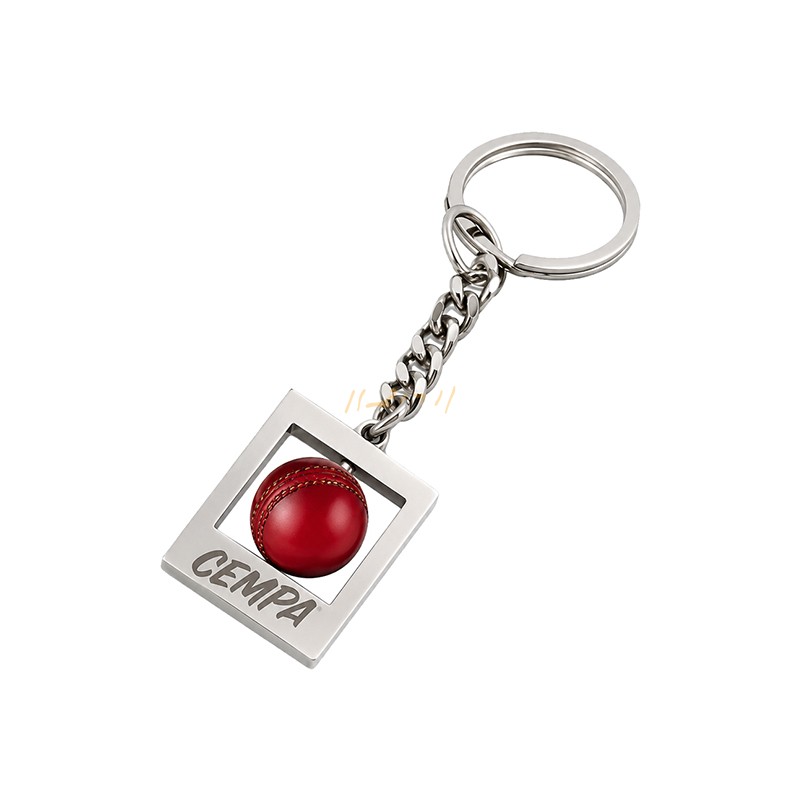 Rectangular Metal Keychain with Rotating Red Cricket Ball